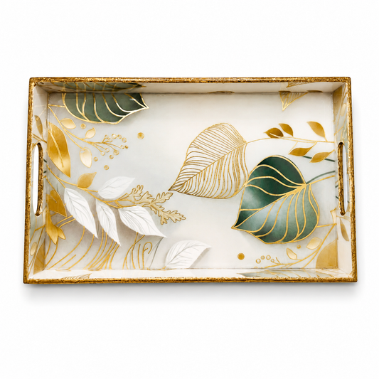 Decorative tray with gold and green leaf patterns on a white background
