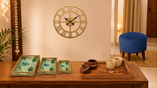 Raksha Bandhan home gift set — enamel nesting trays, wooden serving tray, wall clock and ottoman stool — Rakhi gift ideas for brother or sister's home India 2026 by Sinecraft Creations