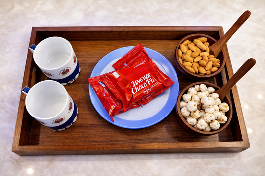 Top view serving tray with bowls filled with dry fruits