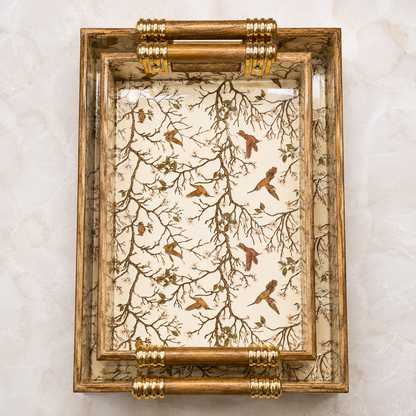 Top view of Ivory Songbird Branch enamel-coated serving tray set of 2 with elegant wooden handles and glossy bird-and-branch design