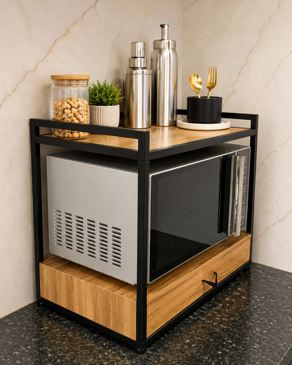 Side view of a black powder coated microwave stand with wooden shelf, storage drawer and kitchen organisers on top.