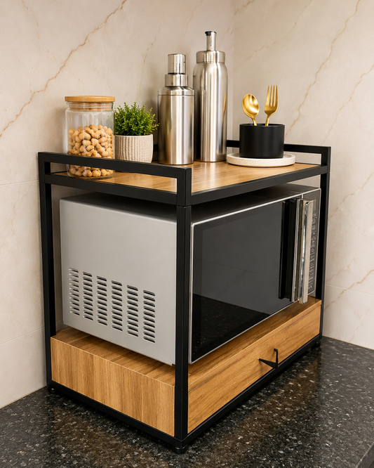 Side view of a black powder coated microwave stand with wooden shelf, storage drawer and kitchen organisers on top.