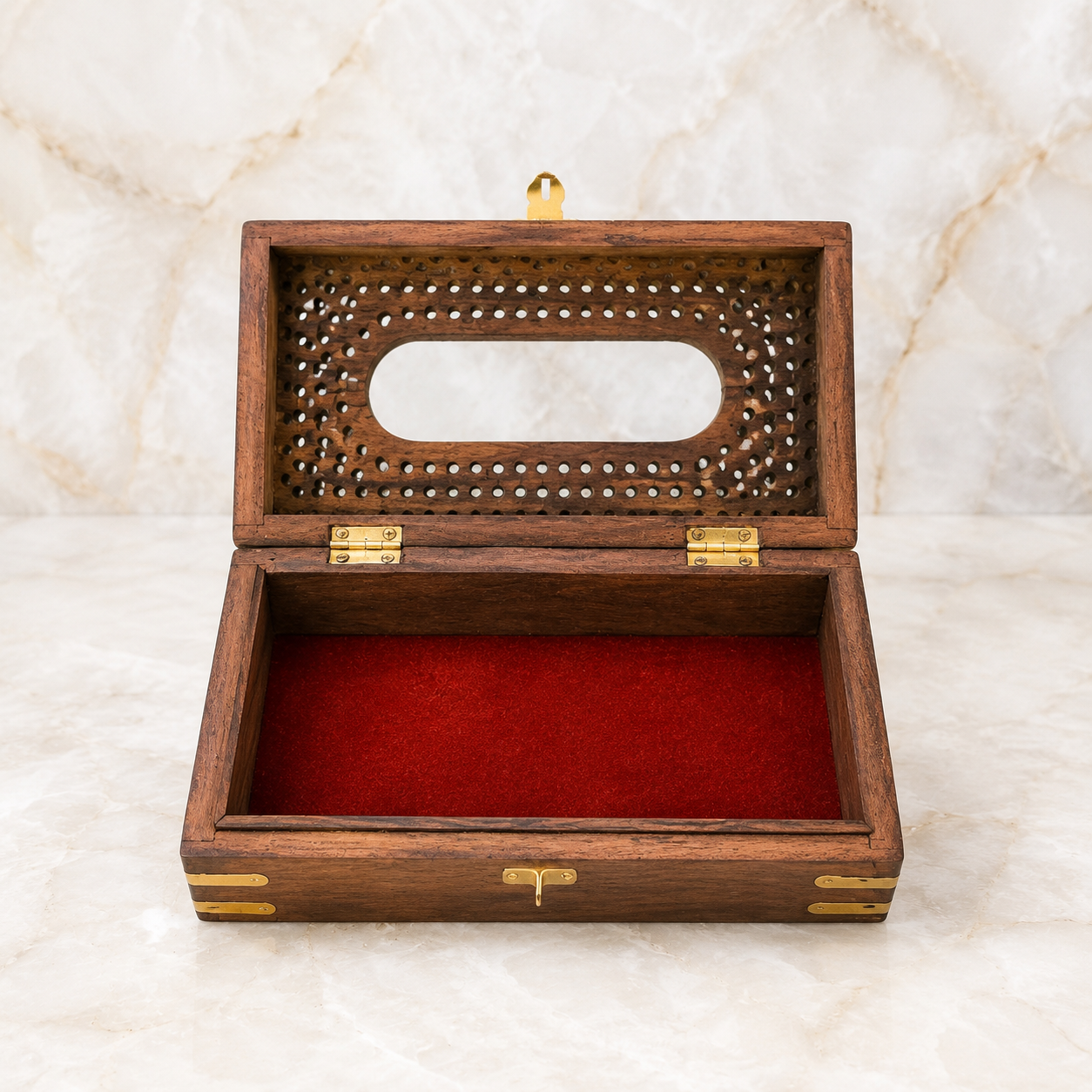 Open carved wooden tissue holder with brass fittings and red fabric lining, 9 x 6 inches