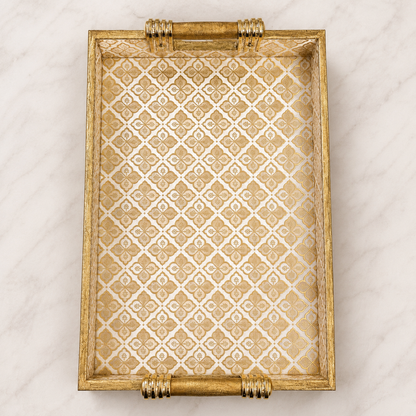 Top view of Royal Gold Trellis large enamel-coated serving tray with elegant wooden handles and ivory gold geometric pattern