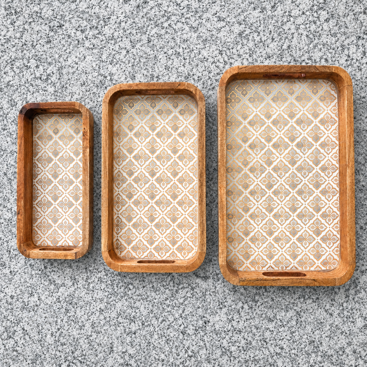 Royal Jali waterproof mango wood enamel tray set of 3 with gold and grey pattern on granite surface