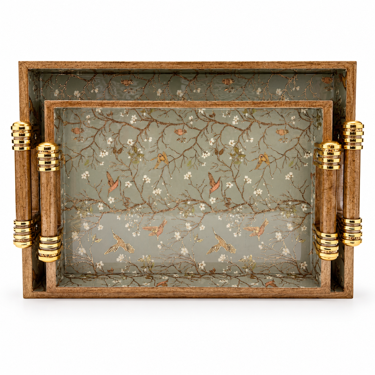 Set of two wooden serving trays with sage green bird and floral designs and gold-accented handles on a white background.