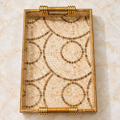 Top view of Sandstone Mosaic Swirl large enamel-coated serving tray with wooden handles and beige circular mosaic pattern