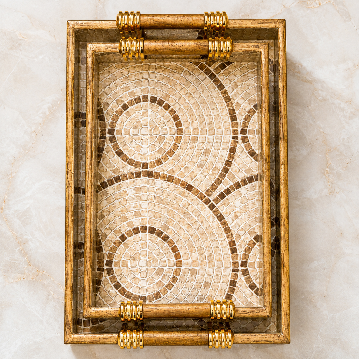Top view of Sandstone Mosaic Swirl enamel-coated serving tray set of 2 with wooden handles and beige circular mosaic pattern