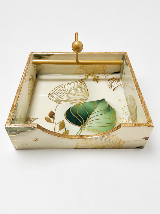 Botanical leaf-design open tissue holder with green detailing, gold accents and metal tissue bar.